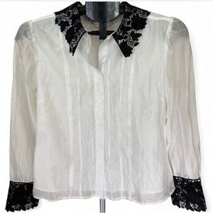 Elegant White Blouse with Black Lace Accents